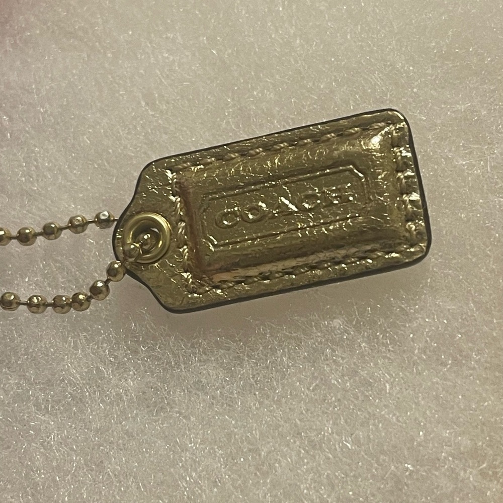 Coach small Gold Leather Tag Pendant